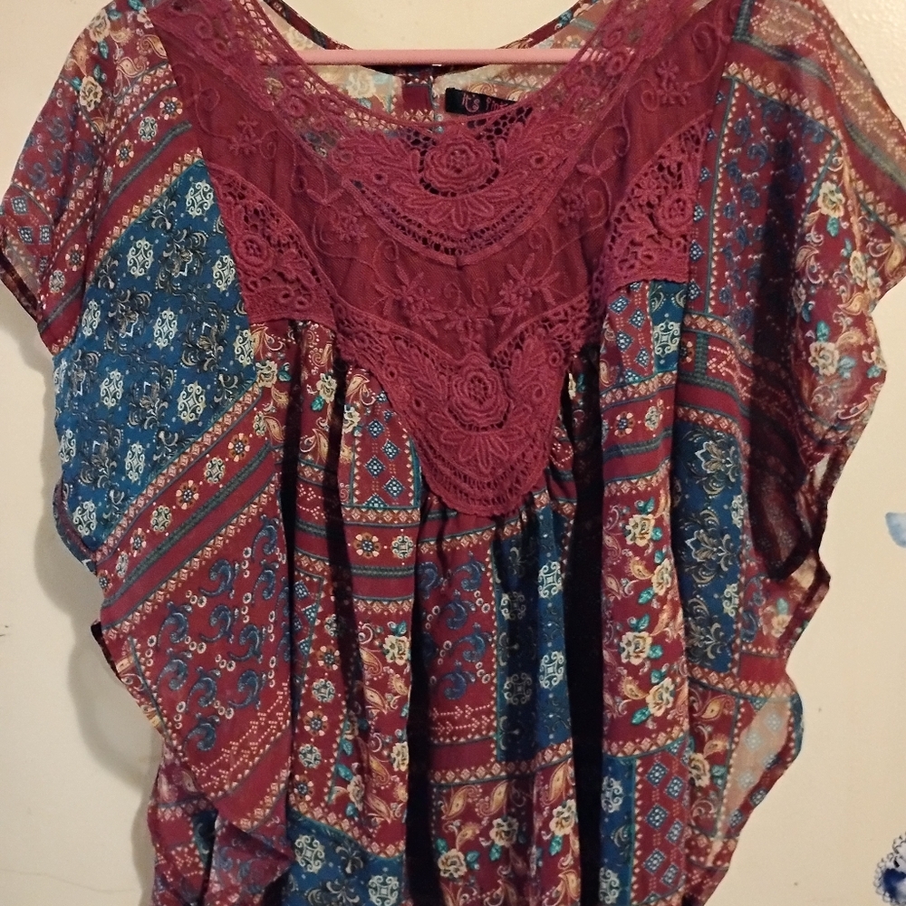 it's Pink beautiful laced top in Medium